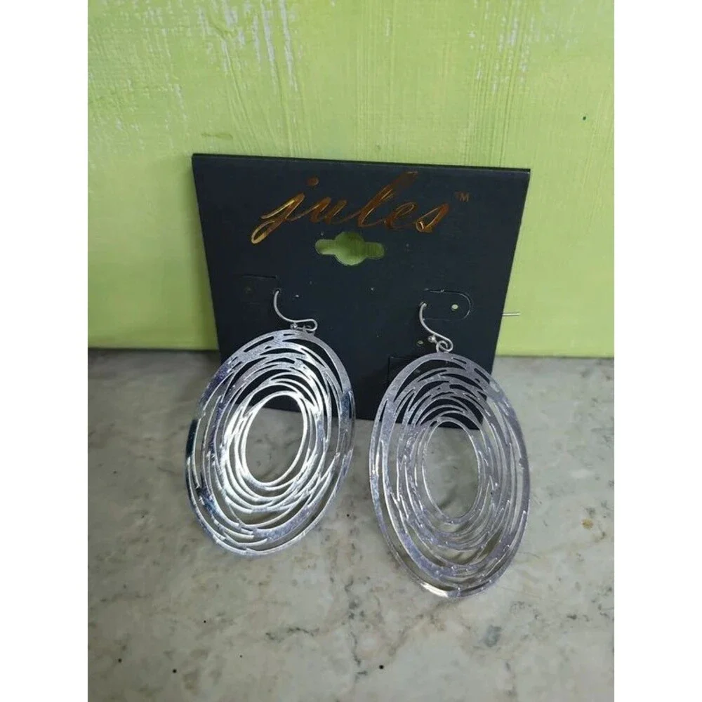 cosmic design earrings by Jules
